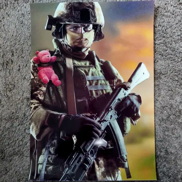 Russian Soldier with Toy Poster, glossy finish, battlefield portrait, 40x30cm