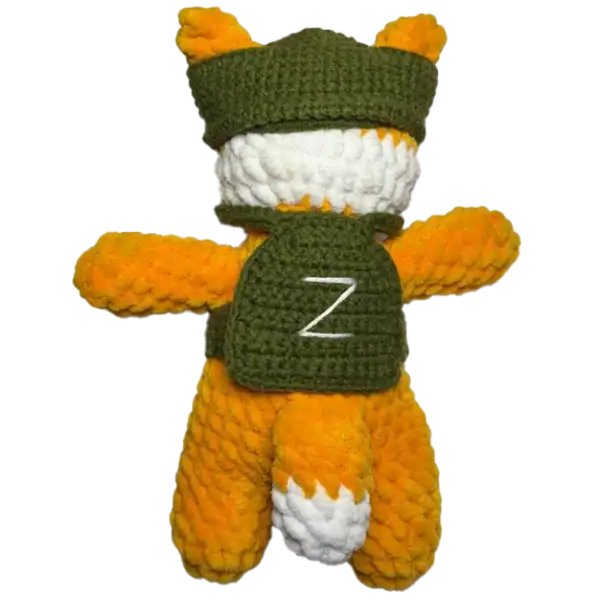 Russian soldier fox talisman soft toy with embroidered Cyrillic text and military-style vest conflict-context collectible