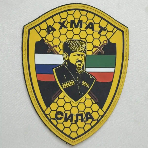Akhmat Sila PVC Patch with Russian and Chechen flags, crossed swords and a central portrait design associated with the Russia–Ukraine conflict.