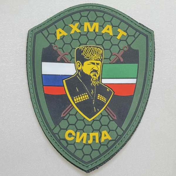 Akhmat Sila PVC Patch with Russian and Chechen flags, crossed swords and a central portrait design associated with the Russia–Ukraine conflict.