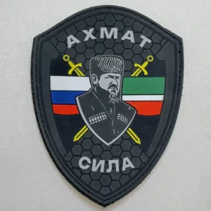 Home 26 Akhmat Sila PVC Patch with Russian and Chechen flags, crossed swords and a central portrait design associated with the Russia–Ukraine conflict.