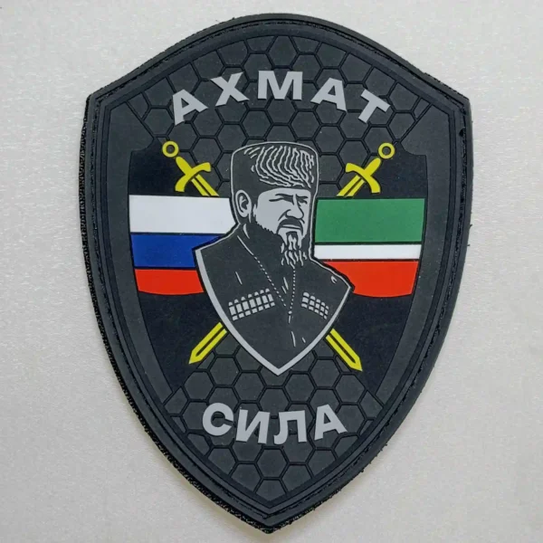 Akhmat Sila PVC Patch with Russian and Chechen flags, crossed swords and a central portrait design associated with the Russia–Ukraine conflict.