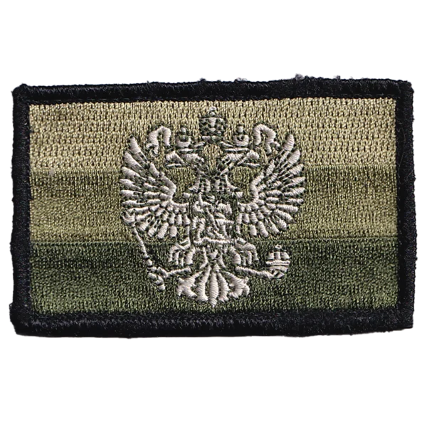 Russian Field Coat of Arms Patch with subdued tricolor background, embroidered double-headed eagle, black border, and field-style military design.