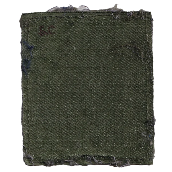 Russian Armed Forces Wool Patch with molded rubber “Russia” lettering, double-headed military eagle emblem, dark olive wool base, and trophy field condition.