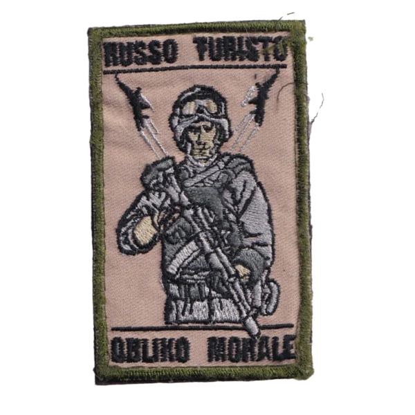 Russian Outlaw Squad Patch with an armed operator, rifle, rocket silhouettes, black lettering, olive border, and trophy provenance from the Russia–Ukraine conflict.