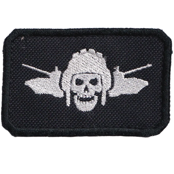 Russian Tank Crew Skull Patch with a white tanker skull, two armored vehicles, black textile field, white embroidery, and combat-used condition.