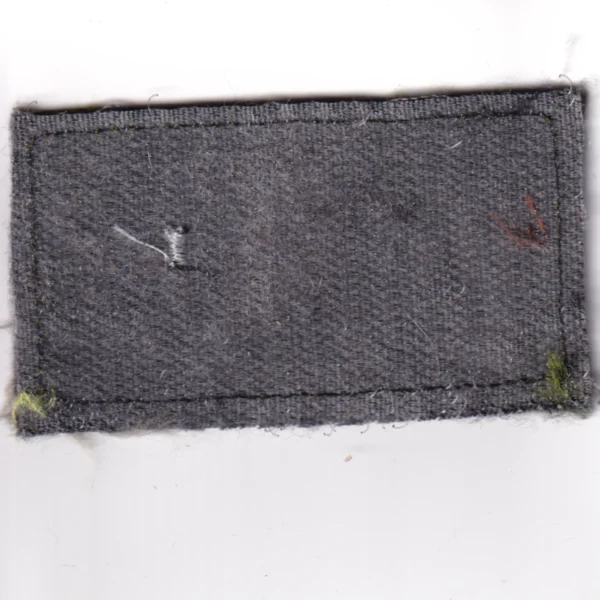 Used Russian Exhausted Not Broken Patch with camouflage fabric, white embroidered text, a red star, and hook-and-loop backing from the Russia–Ukraine conflict period.