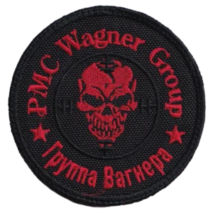 Home 14 Wagner Group Red Skull Patch with red bilingual lettering, central skull emblem, black textile base, circular border, and hook-and-loop backing.