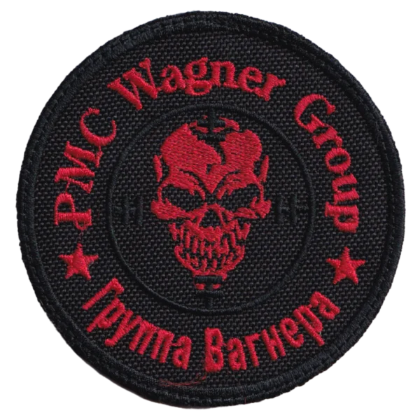 Wagner Group Red Skull Patch with red bilingual lettering, central skull emblem, black textile base, circular border, and hook-and-loop backing.