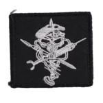 Russian Hippocrates Medic Patch – Rare Combat-Used Insignia 3 Russian Hippocrates Medic Patch with embroidered skull, crossed surgical tools, black fabric, hook backing, and visible combat-used condition.