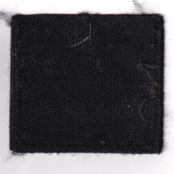 Russian Hippocrates Medic Patch with embroidered skull, crossed surgical tools, black fabric, hook backing, and visible combat-used condition.