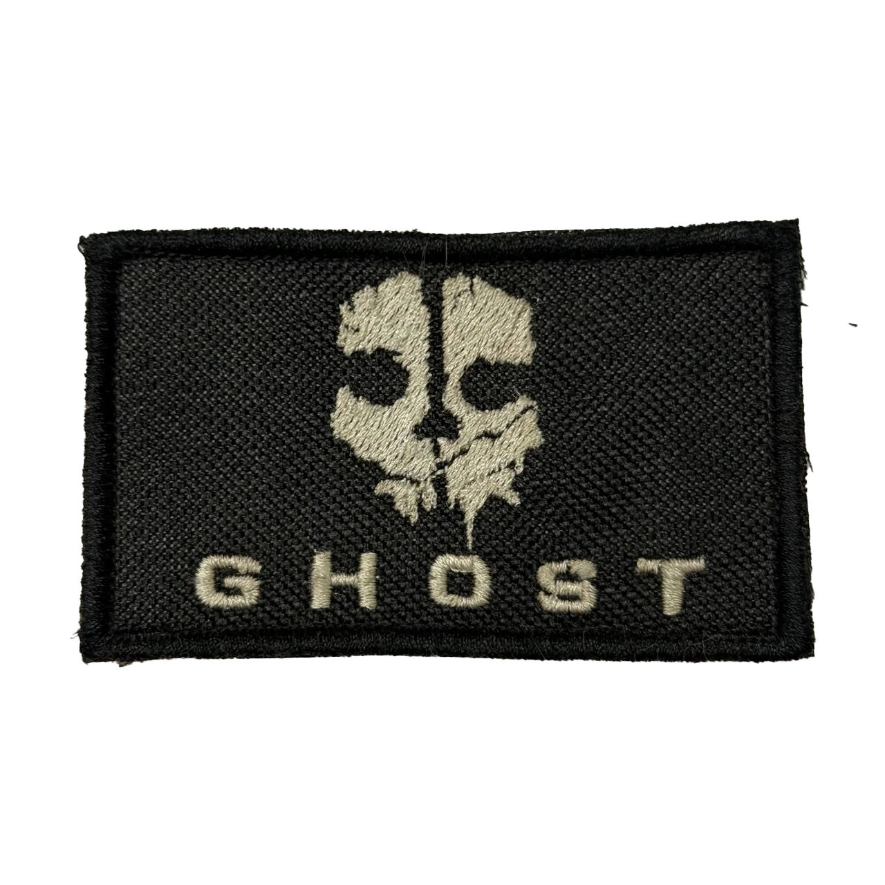 Ghost Skull Patch – Call of Duty Inspired Design 1 Ghost Skull Patch with a pale split skull above the word GHOST on a black rectangular field, front view.