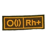 Russian O Positive Blood Patch – Yellow Border 5 Russian O Positive Blood Patch marked O(I) Rh+ in yellow with a yellow border on dark brown, front view.