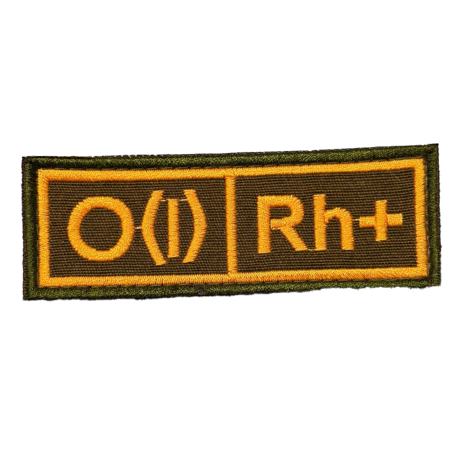 Russian O Positive Blood Patch – Yellow Border 1 Russian O Positive Blood Patch marked O(I) Rh+ in yellow with a yellow border on dark brown, front view.